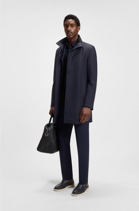COAT WITH CONCEALED CLOSURE